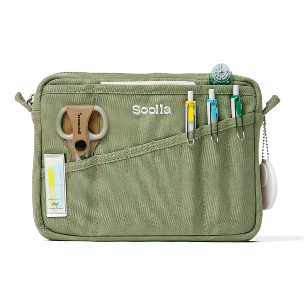 Green travel pouch with various compartments and tools on a white background