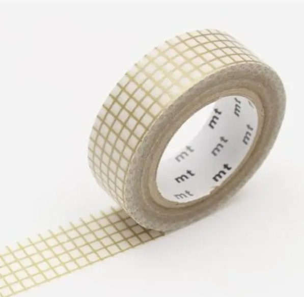 Grid-patterned tape with 'mt' branding on a white background