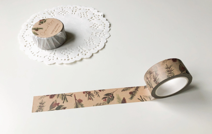 Decorative tape with nature-themed design on a white surface