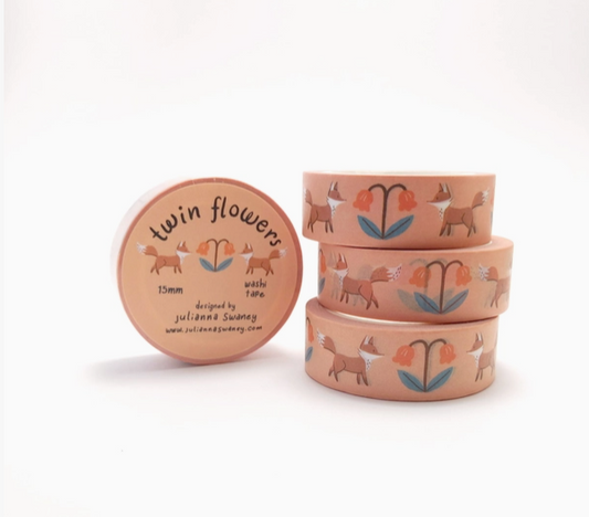Set of three pink containers with fox and flower designs on a white background