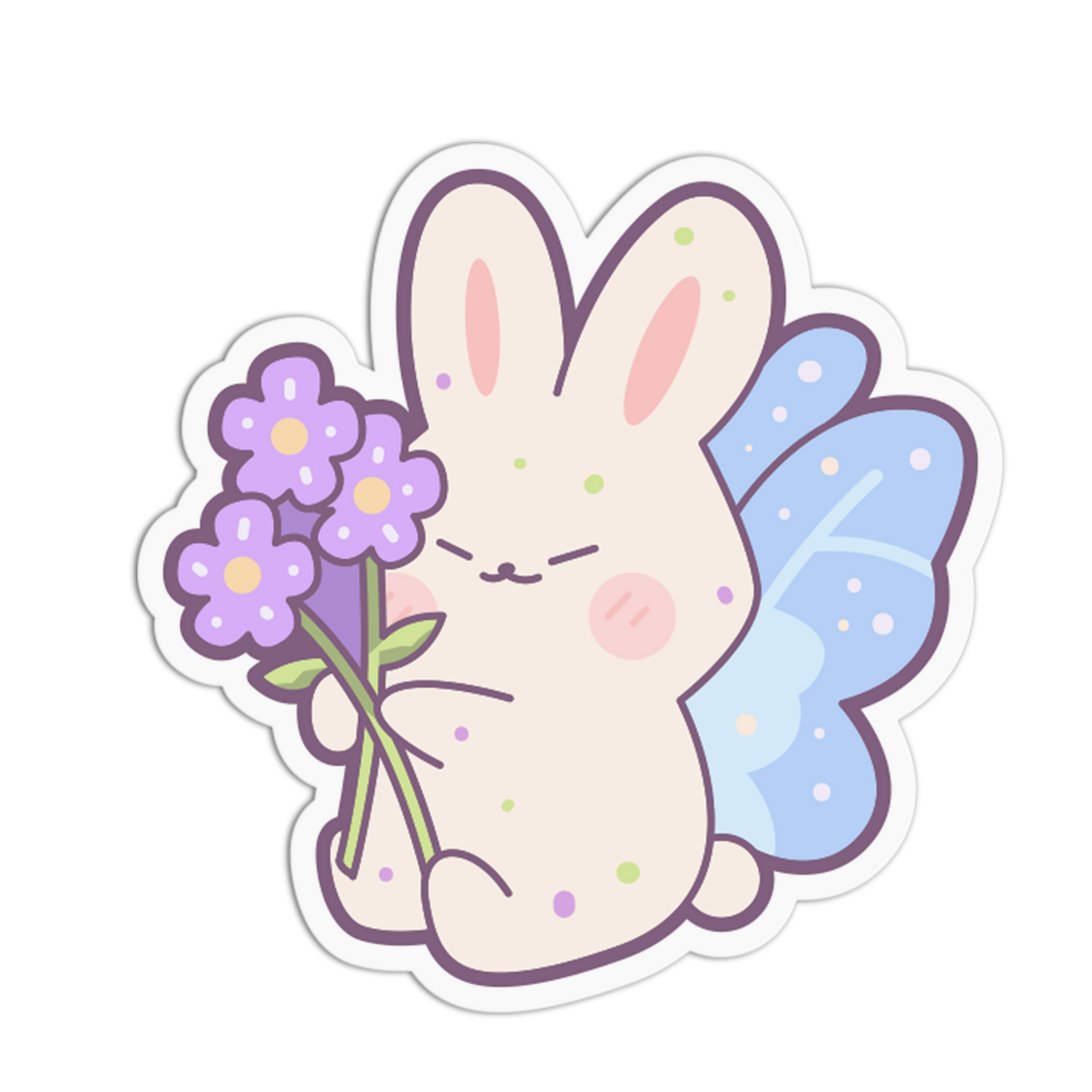 A cute cartoon bunny sticker or decal with pastel colors. The bunny is cream-colored with pink inner ears, closed eyes, a pink blush, green speckles, and light blue wings, holding three small purple flowers with green stems.