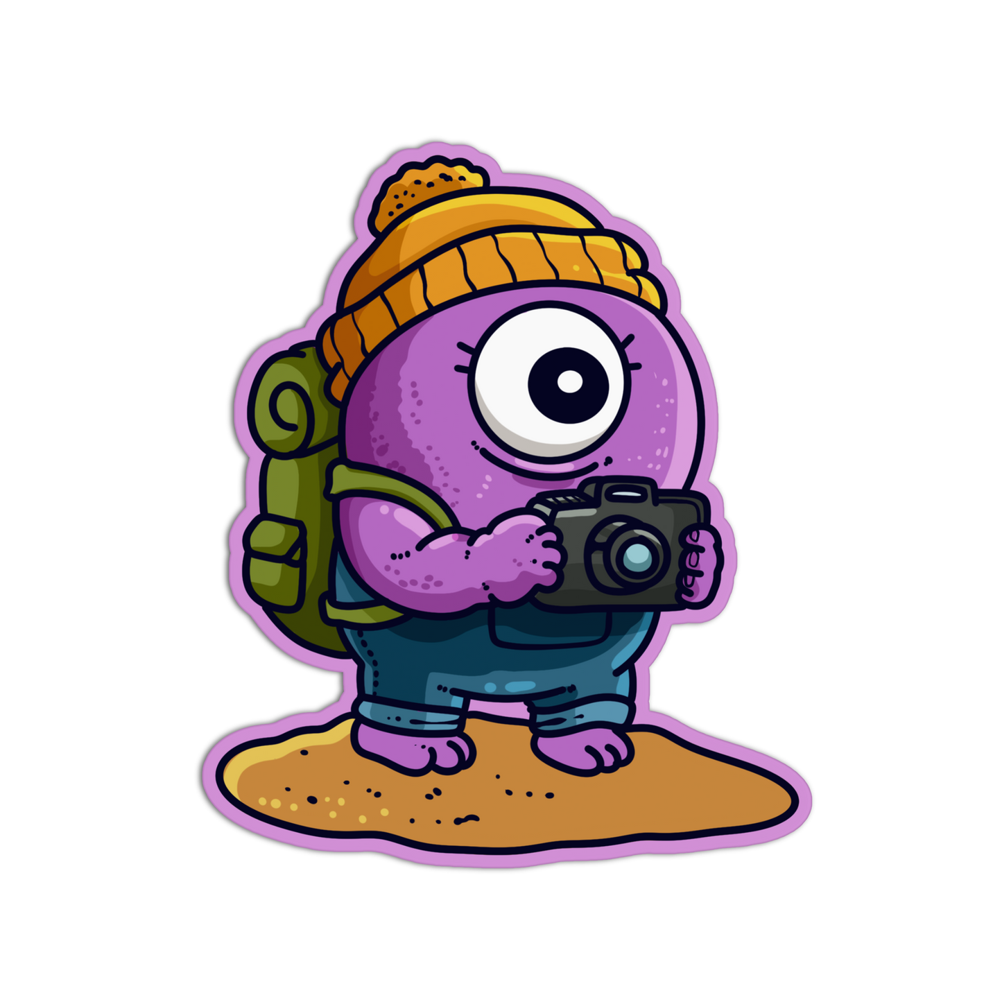 A cartoon sticker or decal of a purple one-eyed character wearing a yellow beanie, green backpack, and blue pants, holding a camera on a sandy patch of ground against a white background.