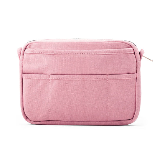 Pink toiletry bag on a white background