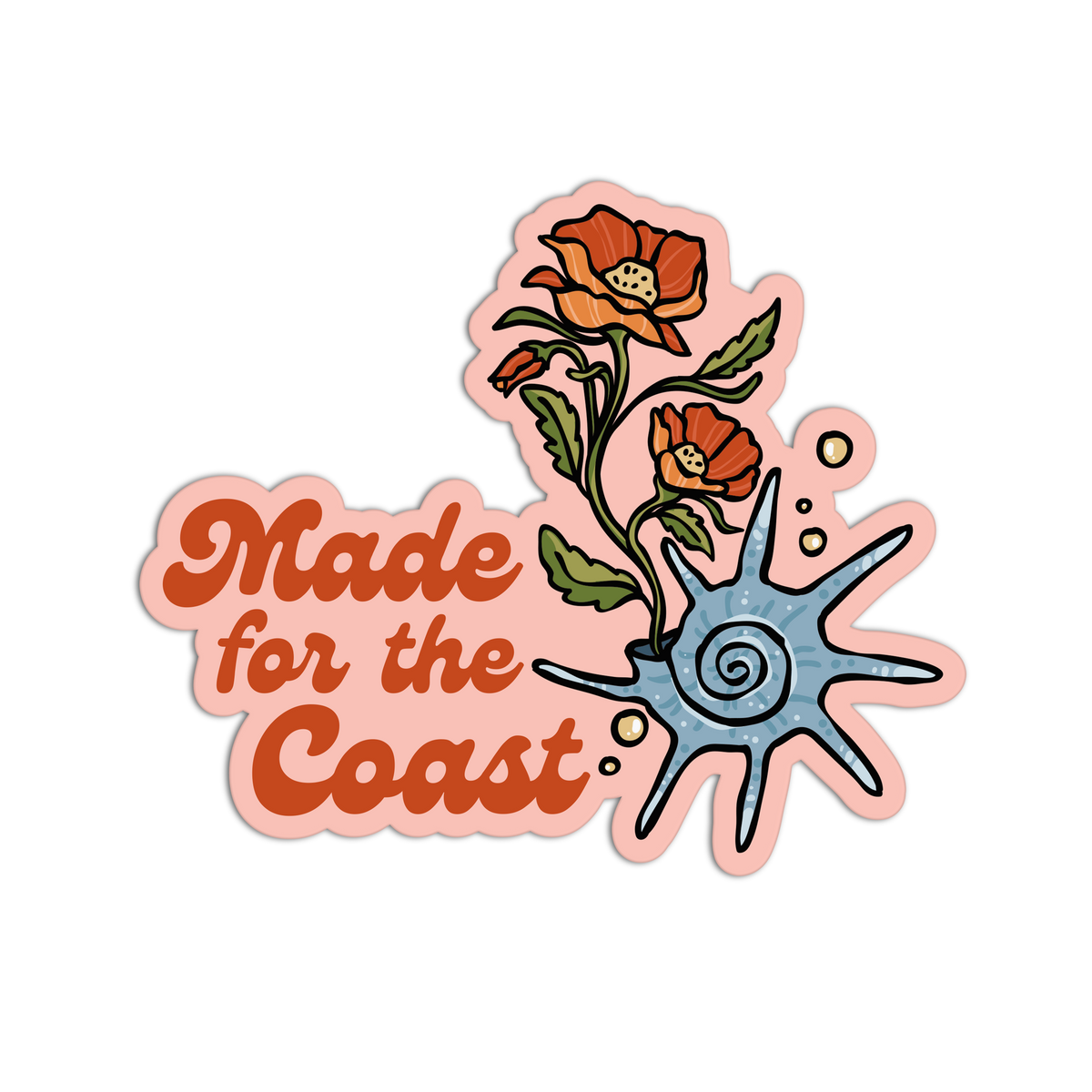 A die-cut sticker featuring the phrase 'Made for the Coast' in orange retro lettering, decorated with two orange flowers, green leaves, and a blue spiral shell on a light pink background.