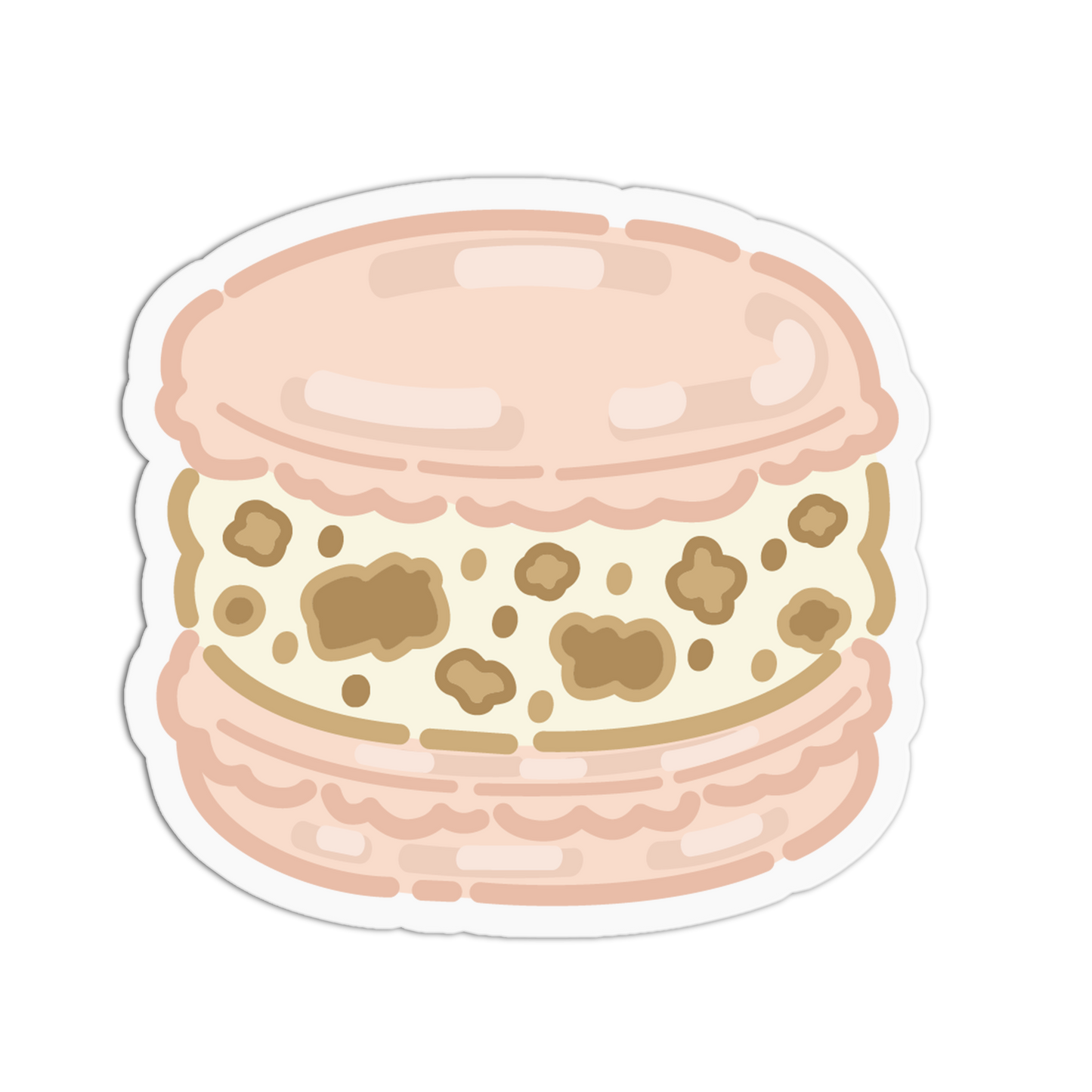 A die-cut sticker featuring a cute, stylized illustration of a macaron with a light pink shell and cream filling with brown spots, shown on a plain white background.