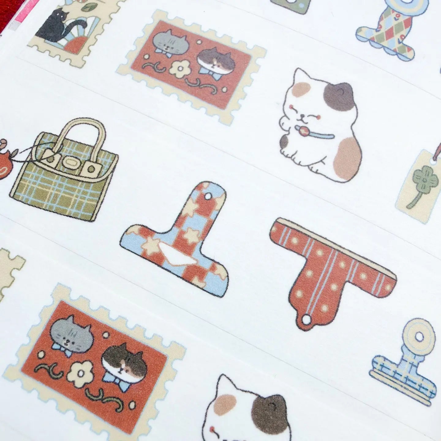 Collection of cute illustrations including cats, a handbag, and office supplies on a white background.