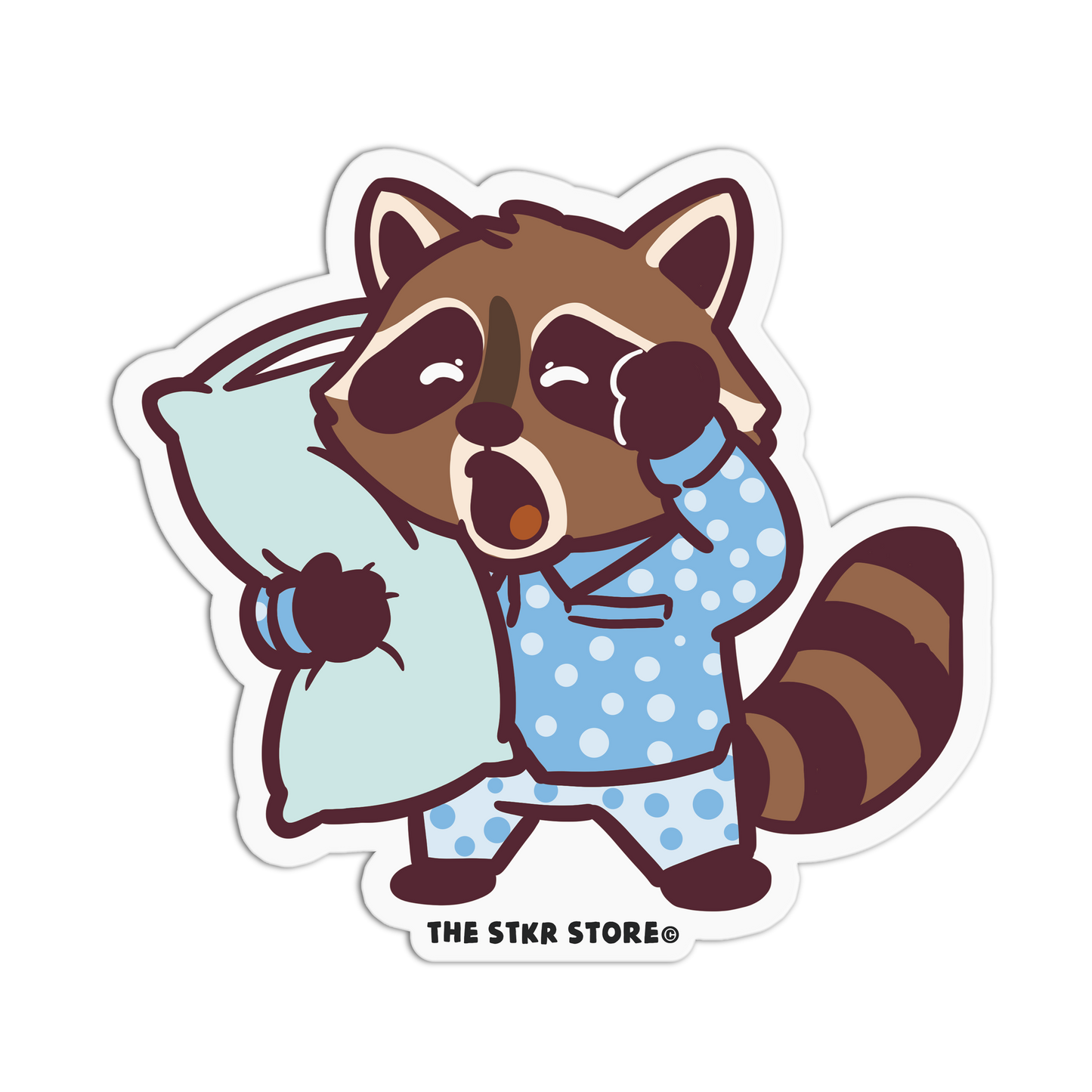 Cartoon raccoon in pajamas holding a pillow with 'The Stkr Store' logo.