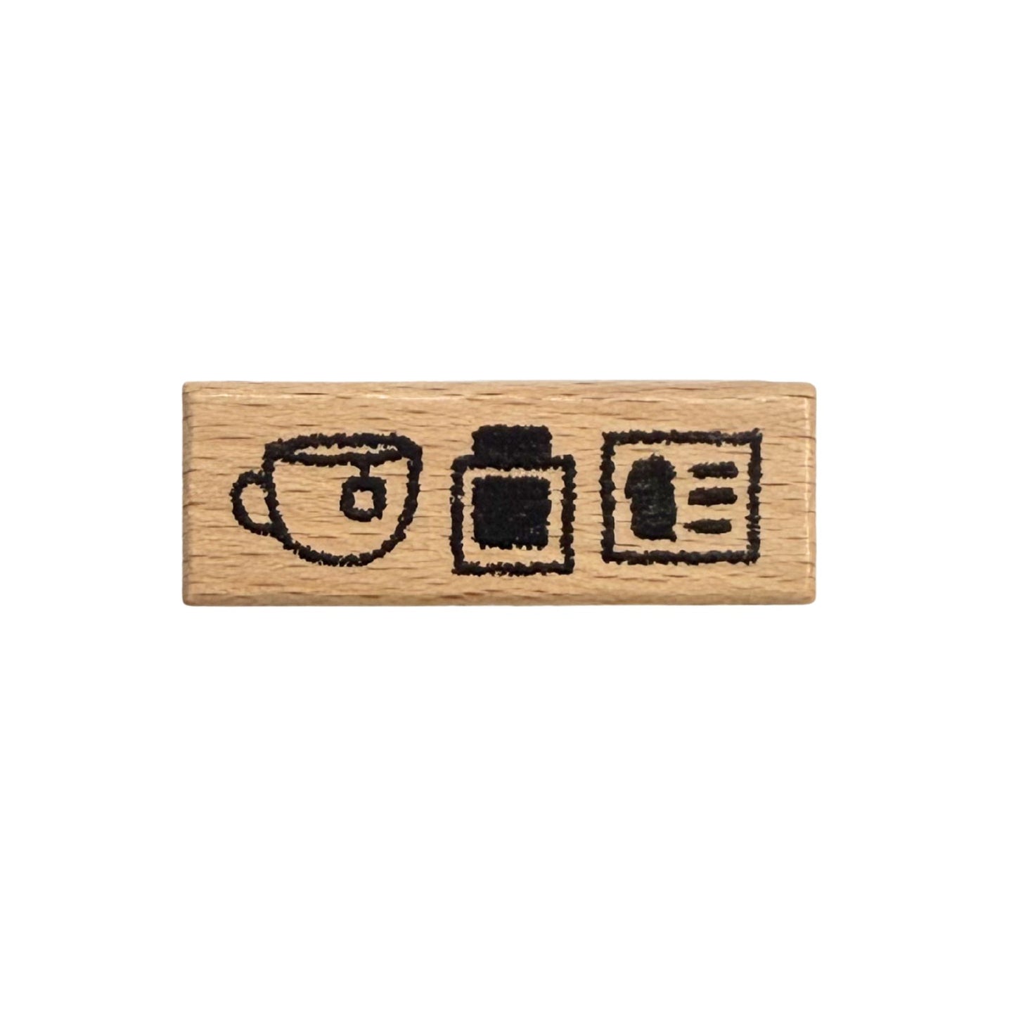 Wooden stamp with tea cup, ink pot, and ink card illustrations on a white background