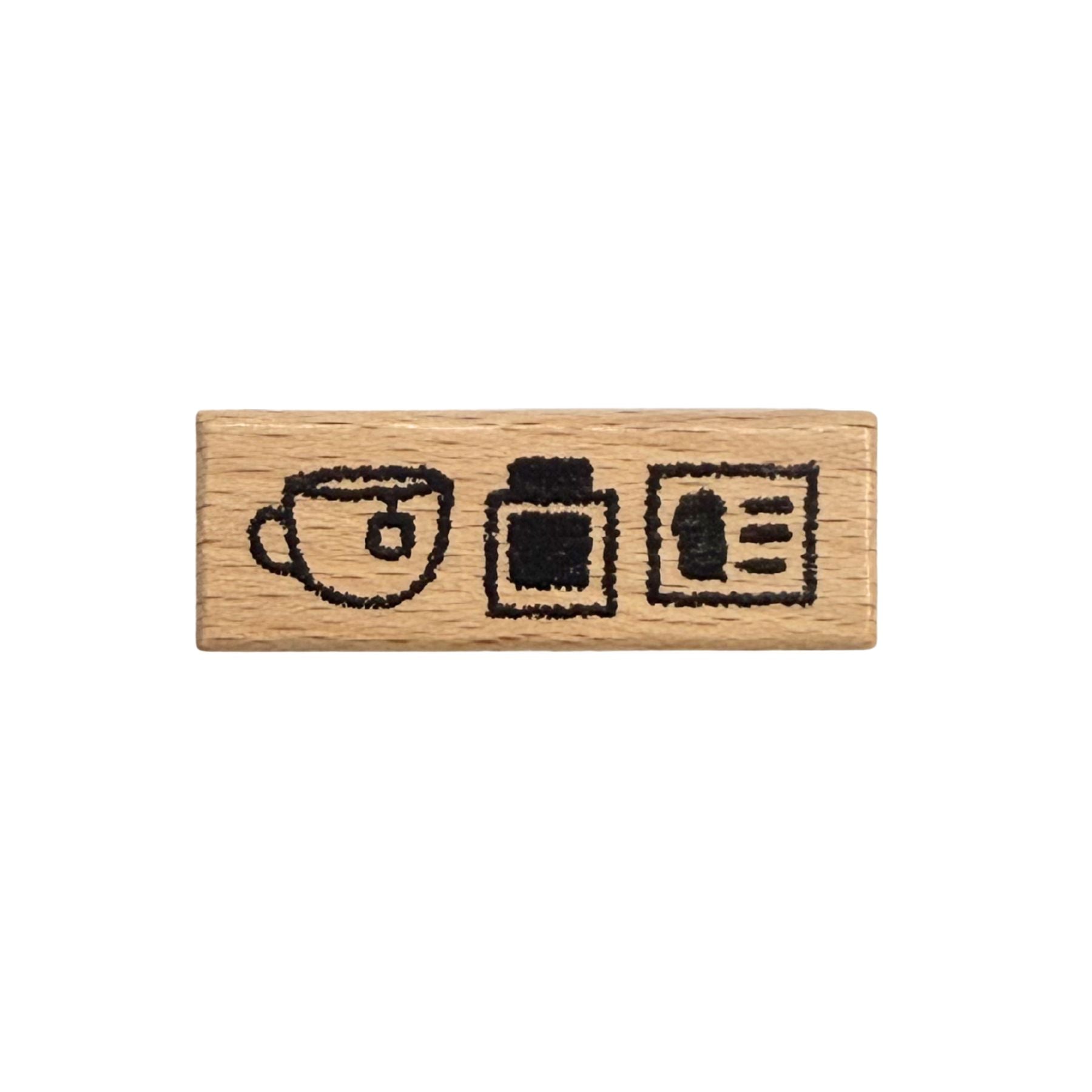 Wooden stamp with tea cup, ink pot, and ink card illustrations on a white background