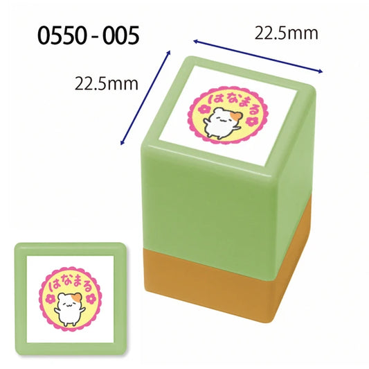 Green rubber stamp with a cartoon design and measurements on a white background
