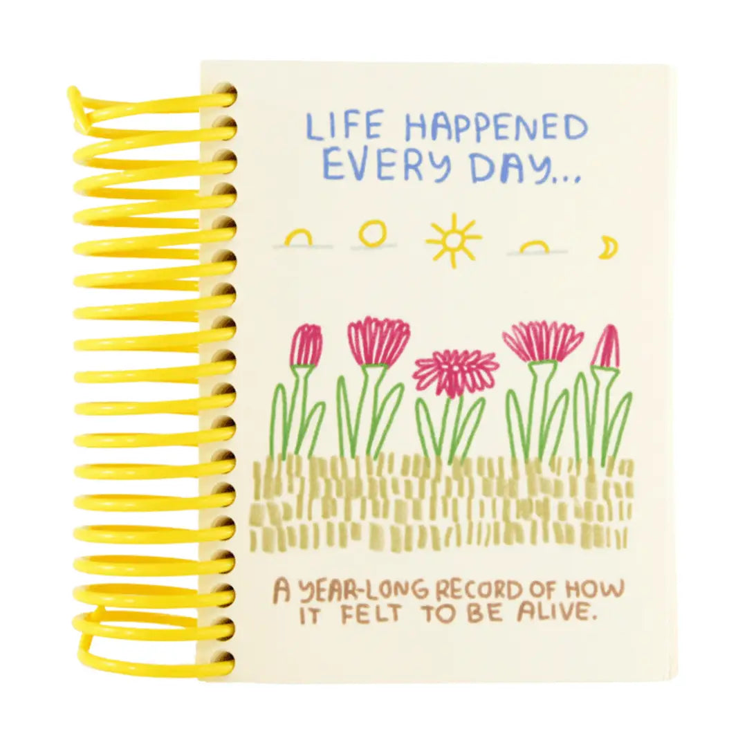 Notebook with floral design and text on a white background