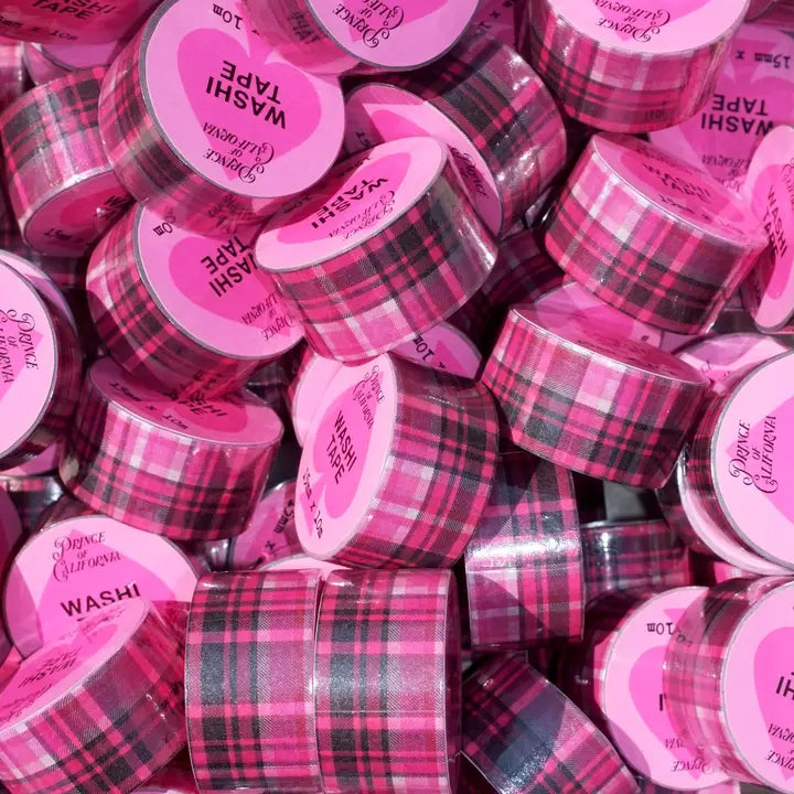Pile of pink washi tape rolls with plaid pattern