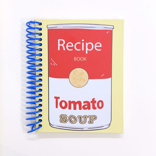 Notebook with tomato soup can design on the cover