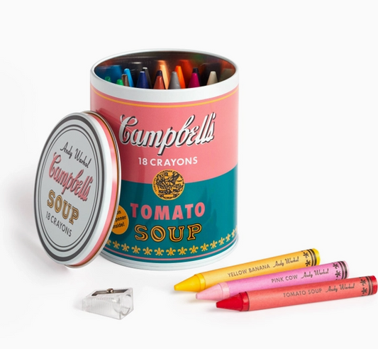 Campbell's Soup can with crayons on a white background