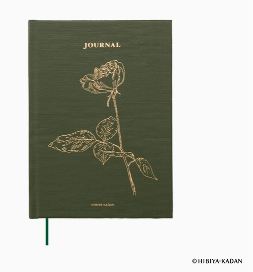 Green journal with floral design and 'HIBIYA-KADAN' branding on a white background