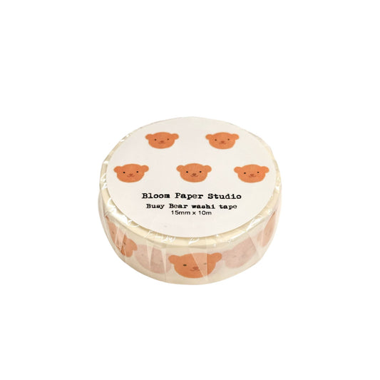 Roll of washi tape with bear designs on a white background