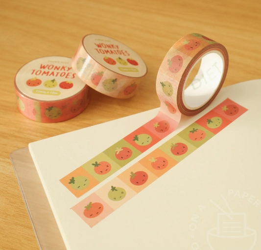 Washi tape with tomato design on a wooden surface