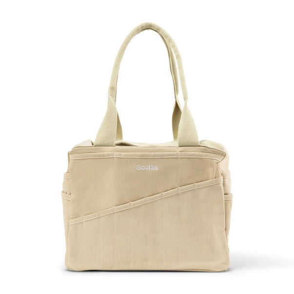Beige tote bag with a visible brand logo on a white background