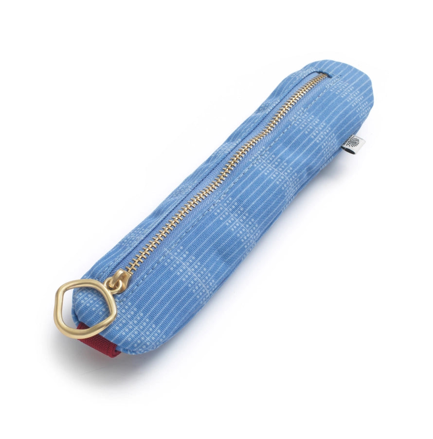 Blue pencil case with gold zipper on a white background