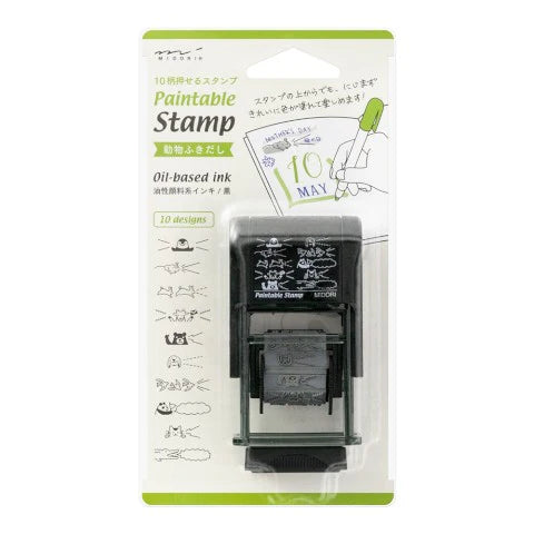 Paintable stamp with oil-based ink cartridge in packaging on a white background