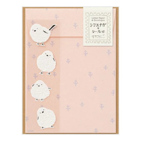 Letter paper set with bird illustrations on a pink background