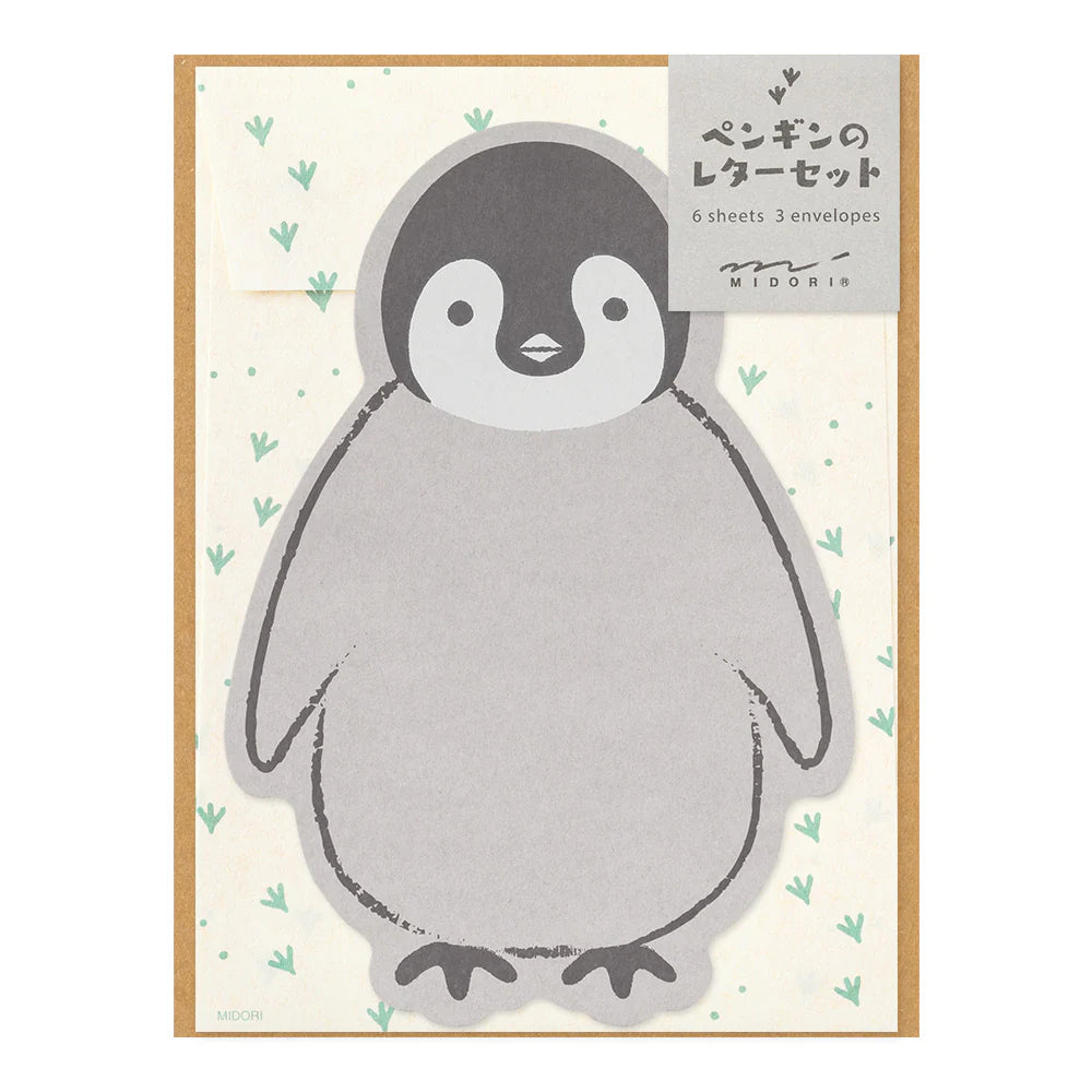 Penguin-themed stationery set with a gray penguin design on a beige background