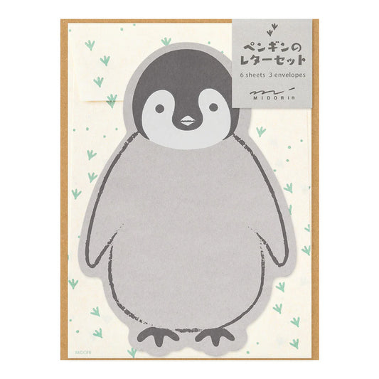 Penguin-themed stationery set with a gray penguin design on a beige background