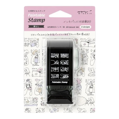 Paintable stamp set with ink pad and design illustrations on a white background