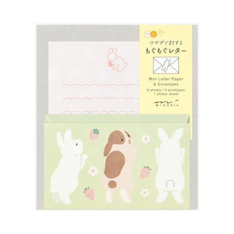 Mini letter paper and envelopes with cute animal designs on a white background