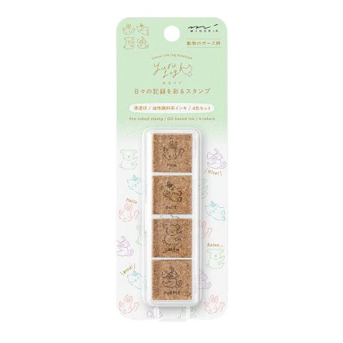 Set of four small stamps in a packaging with cartoon characters on a white background