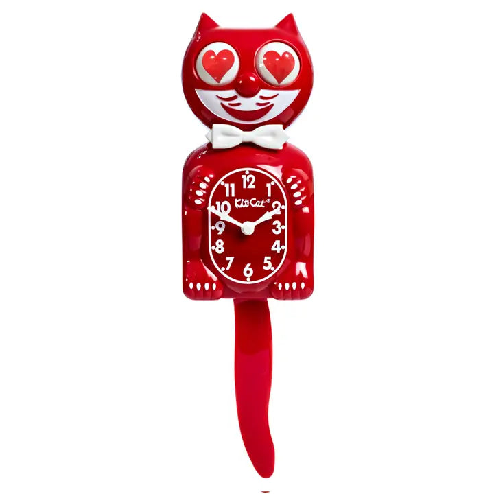 Red cat-shaped clock with heart eyes on a white background