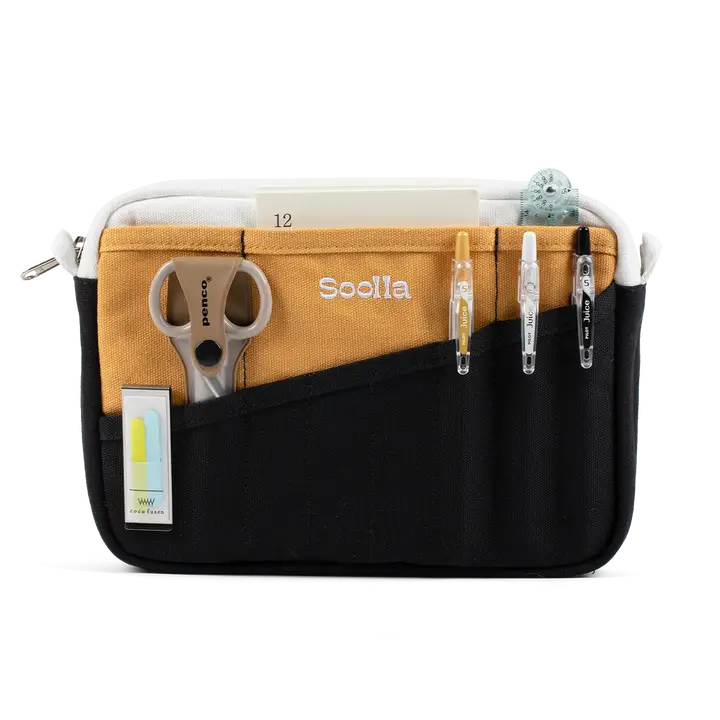 Multifunctional pouch with compartments for scissors, pens, and other items on a white background