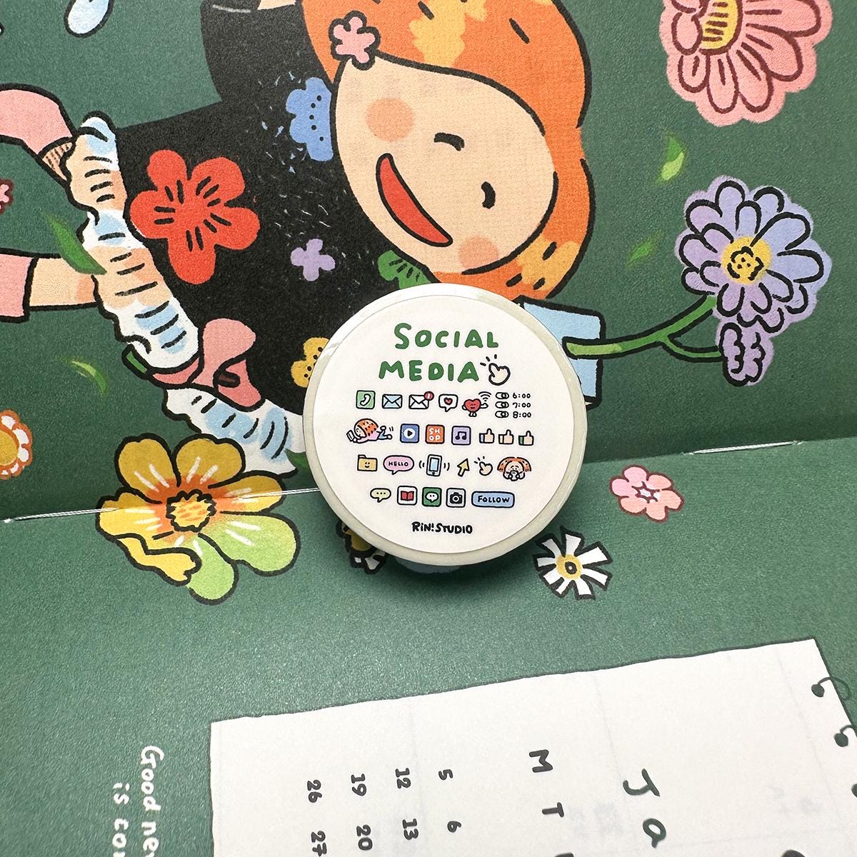 Circular object with social media icons on a green background with cartoon character and flowers