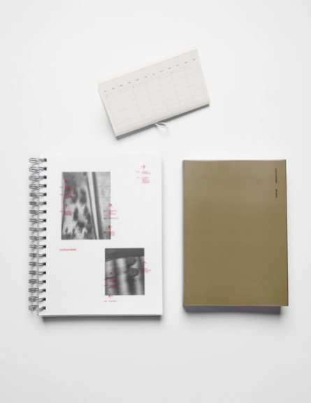 Three notebooks on a white background