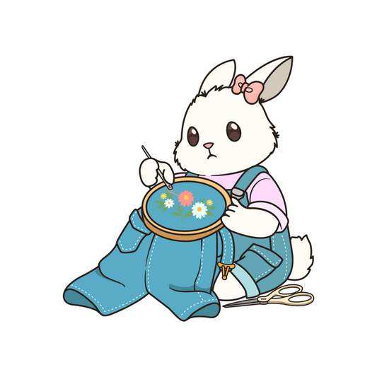 Cartoon rabbit character in overalls holding a embroidery hoop with flowers on a white background