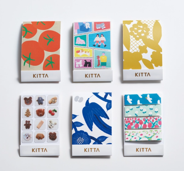 Collection of Kitta products with various designs on a white background