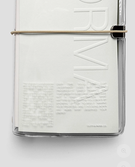 Clear plastic case with embossed text on a white background