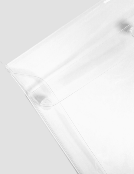 Close-up of a white shirt with a collar on a light gray background