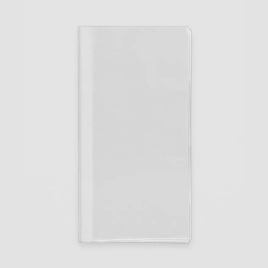 Clear glass rectangular plate on a light gray background