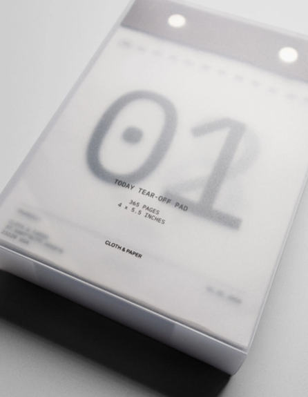 Calendar with tear-off pages on a white background