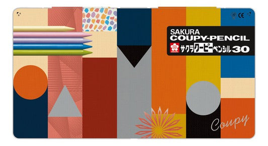 Colorful packaging of Sakura Coupy-Pencil with geometric patterns and brand name.