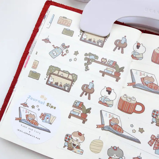 Sheet of decorative stickers with cute illustrations on a white surface.