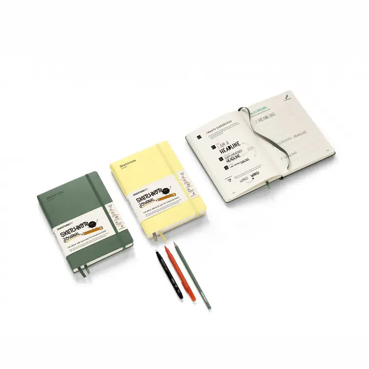 Three Sketchbook notebooks in different colors (dark green, pale yellow, and cream) with their paper covers partially peeled back, displayed alongside three pens (black, red, and gray) on a clean white background.