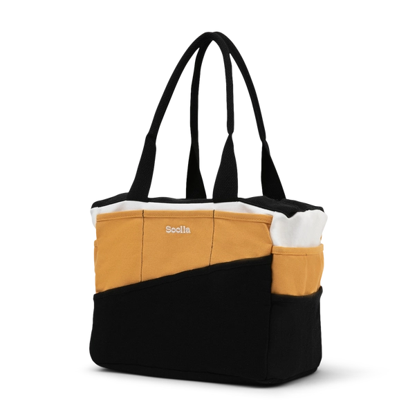 Multicolored tote bag with visible brand name on a white background