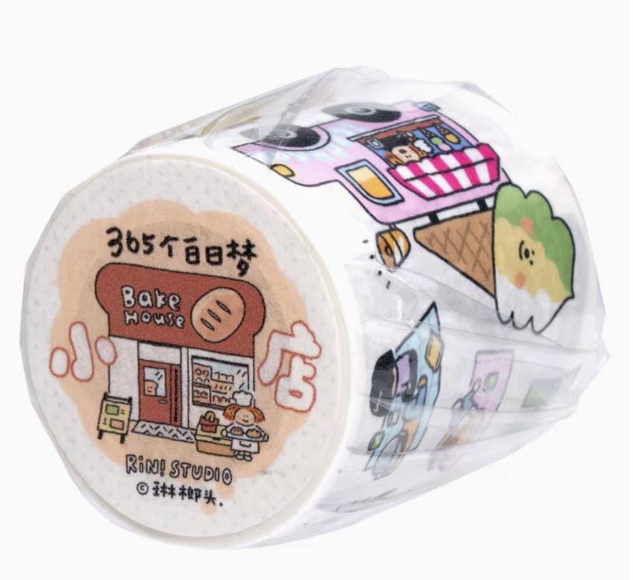 roll of washi tape with cartoon illustrations