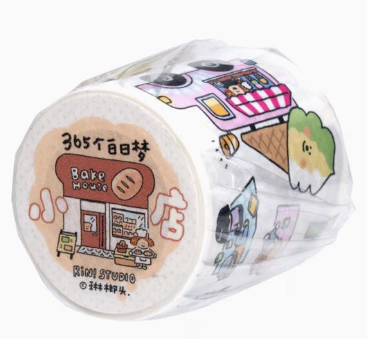 roll of washi tape with cartoon illustrations