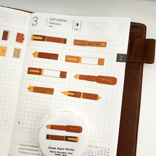 Planner with pen illustrations and a visible brand logo on a white background