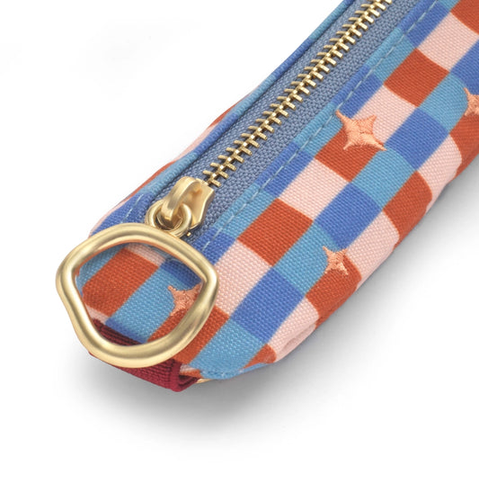 Colorful checkered pouch with gold zipper and clasp on a white background