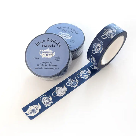 Blue and white washi tape with tea pot design on a white background