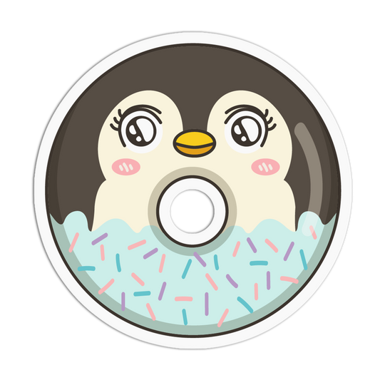 A circular sticker or decal featuring a cute cartoon penguin face inside a donut design. The penguin has cream-colored cheeks, a yellow beak, pink cheeks, and a dark brown head.